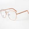Marco de gafas para miopía estilo preppy con cadena de metal irregular anti-luz azul y pierna de cuero, estilo Harajuku retro