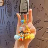 Colgante Auténtico de la Serie Pom-Pom de Crayon Shin-Chan Llavero de Muñeca Linda para Decoración de Mochila de Mujer Regalo Pequeño