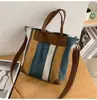 Bolsa de Ombro Grande Capacidade para Mulheres 2026 Nova Coleção Primavera Verão Bolsa de Lona Listrada Bolsa Tote Casual de Ombro Bolsa de Mão para Viagem