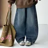 Sudadera de otoño para niñas 2026 nuevo estilo conjunto casual coreano de moda con estampado y jeans de pierna ancha para niñas mayores