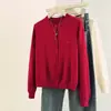 Foto real de cárdigan suéter tejido de hilo de núcleo de gran tamaño para otoño e invierno para mujer, adecuado tanto para usar por dentro como por fuera, con botones bordados en forma de corazón