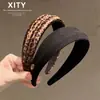 Diadema de moda Dongdaemun con estampado de leopardo, estilo coreano, diadema de alta cobertura para peinar el cabello, un accesorio de alta gama y versátil para salidas