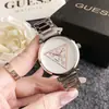 Nuevo reloj de mujer con correa de acero y temperamento, moderno y sencillo, estilo Joker, informal, de cuarzo, para una generación de mujeres.