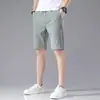 Shorts de Seda de Gelo masculino verão 2022 estilo coreano solto costura elástica etiquetagem shorts de praia