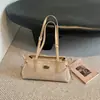 Bolso de axila con acabado mate de gamuza para mujer, nuevo bolso de mano horizontal de moda de nicho 2026, adecuado para ir al trabajo