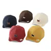 Sombrero de color sólido versátil para bebé con ala suave al por mayor nuevo sombrero solar transpirable para niño pequeño gorra de béisbol linda de cachorro para bebé