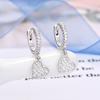 Pendientes de mariposa con corazón microincrustado para mujer, diseño de nicho de lujo ligero, nuevos pendientes de aguja de plata 925 de alta calidad.