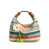 Bolso de paja a rayas de arcoíris para mujer, nuevo modelo de verano 2026, bolso de hombro tejido para vacaciones en la playa, bolso tipo dumpling para ir al trabajo