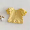 Camiseta de Verano de Manga Corta para Niña, Marca de Moda y Tendencia para Bebé, Bordes con Volantes, Botones de Flor de Colores, Mangas Abullonadas