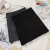 Falda midi de lana negra con lentejuelas súper bonita otoño talla grande para chicas gordas cintura alta adelgazante línea A cadera envolvente falda corta