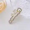 Nuevo pasador de pelo con flequillo de conejo ingenioso ojo de gato con perla, clip para cabello suelto, joyería de diamantes brillante a la moda