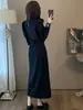 Elegante traje de falda de moda negro para mujer, nuevo estilo de otoño, conjunto elegante y adelgazante de sudadera y falda de dos piezas