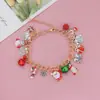 Pulsera de Cadena Navideña Transfronteriza Europea y Americana Aleación Esmalte Árbol de Navidad Reno Campana Copo de Nieve de Diamante Pulsera de Regalo para Mujeres