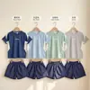 Conjunto Esportivo Duas Peças Casual de Verão Respirável com Sensação de Gelo Unissex para Crianças Uniforme Escolar Estudante Uniforme de Jardim de Infância Shorts de Manga Curta