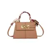 Bolsa de mão feminina de nicho, novo modelo outono 2026, bolsa de ombro casual retrô texturizada, bolsa pequena quadrada transversal para o trabalho