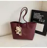 Bolsa casual transfronteiriça de grande capacidade, nova bolsa tote estilosa e minimalista para mulheres, adequada para o trabalho e o trajeto diário, bolsa de ombro e bolsa de axila