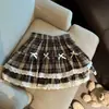 Saia Puffy de Xadrez Y2K com Camada Dupla, Renda Fashionável nas Costuras e Decoração de Laço, Estilo Kawaii Menina
