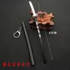 La hoja de extinción de fantasmas alrededor de la puerta de la cocina carbón curado Rueda de cuchillo Lang Day mi esposa buen escape vaina arma modelo llavero de metal 17cm