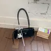Bolso de Mano Versátil de Moda con Lazo 2026 Nuevo Elegante Bolso de Hombro para Viajes Cotidianos Textura de Alta Calidad Bolso de Axila para Mujer