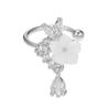 Clip para oreja de flor de diamante súper brillante, aretes pequeños frescos, estilo de hadas de lujo ligero, aretes creativos sin agujeros en las orejas al por mayor