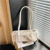 Bolso de lunares de moda y tendencia, nicho, para mujer, nuevo modelo 2026, versátil para ir al trabajo, bolso de hombro, bolso de axila, bolso de mano, bolso baguette