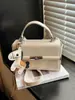 Bolso de Mano Mini Exquisito de Textura de Alta Gama para Mujer 2026 Nueva Moda Versátil Bolso Cruzado Bolso Cuadrado Pequeño Retro de Cuero Aceitoso