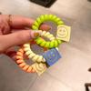 Color fluorescente estilo coreano línea telefónica Anillo para el pelo etiqueta de tela cara sonriente color de contraste cuerda de cabeza colorida banda de cuero para el pelo de niña linda