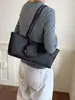 Moda minimalista coreana y japonesa 2026 verano nuevo para mujer de alta gama versátil para ir al trabajo nicho bolso de mano de un solo hombro bolso tote
