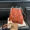 2026 Nueva Bolsa Vintage de Cuero Suave para Mujer, Bolso de Hombro Cruzado de Moda para Dama, Bolso de Pinza de Mano para Comercio Transfronterizo