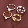 Elegante conjunto de dos piezas de anillos huecos de corona incrustados con circonita, regalo de vacaciones, versátil y elegante, joyería de anillo para mujer de cobre puro