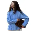 Moda transfronteriza europea y americana, chaqueta casual de color liso estilo Harajuku con cuello alto para mujer, con cintura de cordón y diseño de bolsillo, al por mayor
