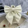 Gravata borboleta uniforme JK raiz de pena ciano-avermelhada cor sólida ângulo oblíquo japonês estudante raiz de pena gigante flor de gola uniforme de marinheiro objeto pequeno