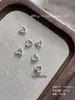 Nuevos Accesorios de Arte de Uñas Corazón Hueco de Aleación Franceses Retro Lujo Ligero Corazón 3D Decoración DIY para Uñas Venta al por Mayor