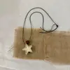Nova Colar com Pingente de Borla Geométrica Chinesa Estilo Étnico Design de Nicho Corrente Longa para Suéter Ornamento de Colar Moderno Versátil para Mulheres
