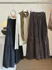 Falda midi de terciopelo con lunares estilo francés para mujer, nueva colección otoño/invierno 2026, cintura elástica, línea A, que cubre la cadera, acampanada, diseño de volantes