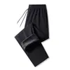 Calças esportivas de algodão de cor sólida para primavera e verão para homens, calças casuais em tamanhos grandes, calças jogger retas largas com punhos