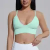 Sujetador deportivo de punto sin costuras de color liso ajustado para mujer, transfronterizo europeo y americano, adecuado para correr, fitness y yoga