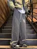Pantalones de Rayas Verticales Blancos y Negros para Hombres y Mujeres 2024 Nuevos Pantalones Rectos Caídos de Primavera y Otoño para Adolescentes Pantalones Casuales Resistentes al Desgaste