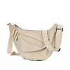 Bolso ligero para mujer estilo coreano, nuevo bolso tipo dumpling de nailon 2026 con correa de hombro ancha, bolso de hombro simple de color liso