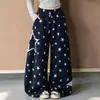 Calça larga estampada de estrelas para meninas, nova coleção primavera/outono 2026, com design falso de duas peças, adequada para meninas de tamanho médio a grande, em estilo de calça longa solta e casual estilo americano