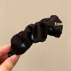 Pinza de plátano de lujo ligero otoño/invierno para mujer, nuevo estilo 2026, pinza vertical grande de alta gama para el cabello, pinza de pelo versátil estilo coreano para coleta alta