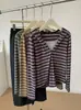 Sudadera con capucha a rayas estilo dos piezas para mujer, top casual de moda coreana, nueva para otoño de 2026