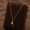 Collar de calabaza de oro vintage acero de titanio para mujer galvanizado al vacío Fu Lu mini calabaza bola pequeña sólida borla cadena de clavícula