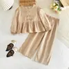 Traje de Niña Otoño 2025 Venta Caliente de Comercio Exterior Sudadera de Cuello Redondo Rayada para Niña Conjunto de Dos Piezas con Top de Manga Larga y Pantalones