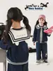 Wuli Bu Yi Procesamiento y Personalización Faldas Cortas de Primavera y Otoño para Niñas Camisetas Rayadas Versátiles Pantalones de Pierna Recta Chaquetas con Solapa Modernas