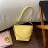 Bolso Pequeño Super Popular Transfronterizo para Mujer, Nuevo Estilo Coreano Verano 2026 Bolso de Hombro Cruzado Individual, Bolso Cubo de Cadena Acolchado Más Vendido