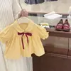 Conjunto Nuevo de Verano 2026 para Bebé Niña Estilo Coreano con Camisa de Muñeca con Lazo y Shorts de Mezclilla Conjunto de Dos Piezas Moderno