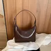 Bolsa Retro de Axila Feminina 2026 Novo Estilo Fashionável Chique Bolsa de Ombro Único Transversal Bolsa de Bolinho de Alto Valor Bolsa de Mão