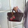 Bolsa de balde versátil e estilosa para uso transfronteiriço, bolsa de ombro e transversal moderna para o dia a dia e para o trabalho, bolsa de mão de nicho minimalista e moderna