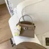 Bolso Pequeño Minimalista de Alta Gama Transfronterizo, Bolso de Hombro Cruzado de Moda, Bolso de Mano Elegante Tipo Kelly, Bolso de Mano Nuevo Versátil